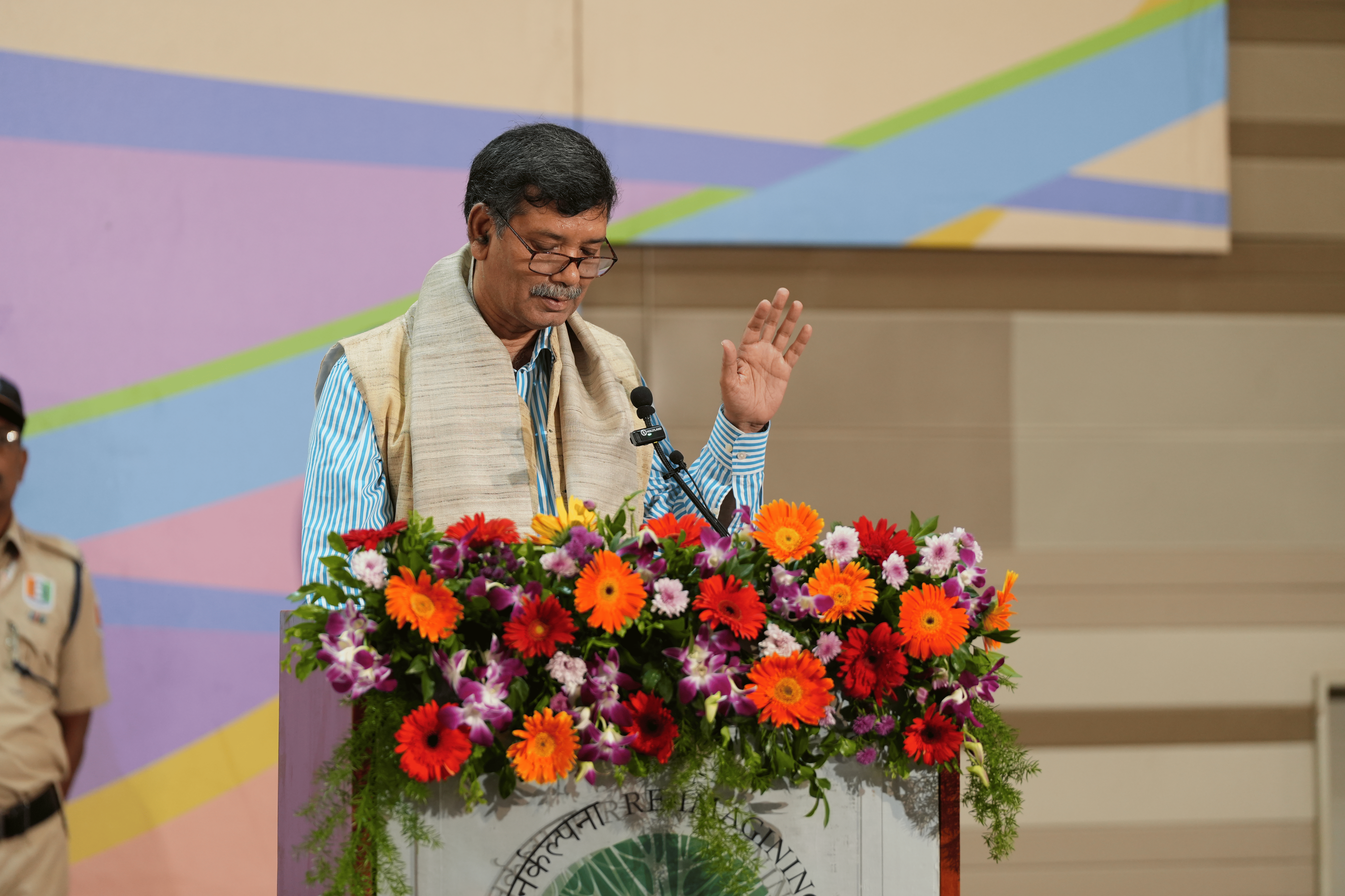 Vice-Chancellor delivering the welcome address at the podium